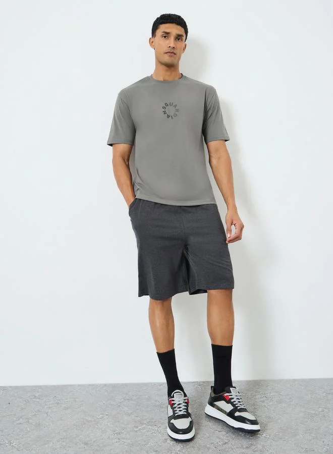 Styli Men Grey Oversized Slogan Print T-Shirt