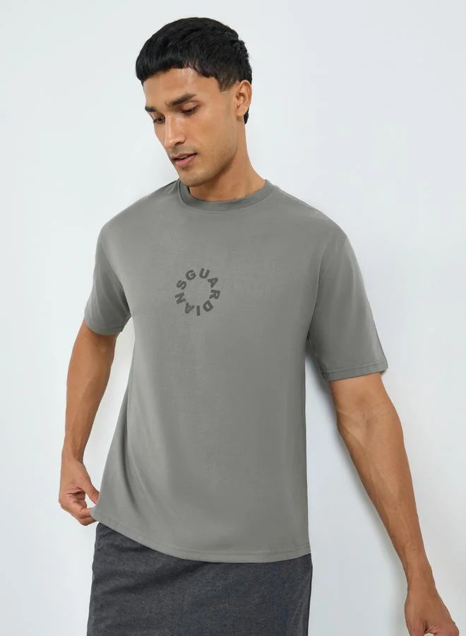 Styli Men Grey Oversized Slogan Print T-Shirt