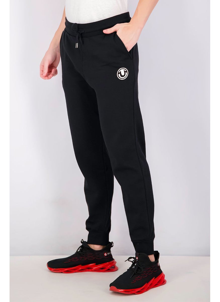 TRUE RELIGION - Men Graphic Printed Drawstring Jogger Pants, Black - Image 1