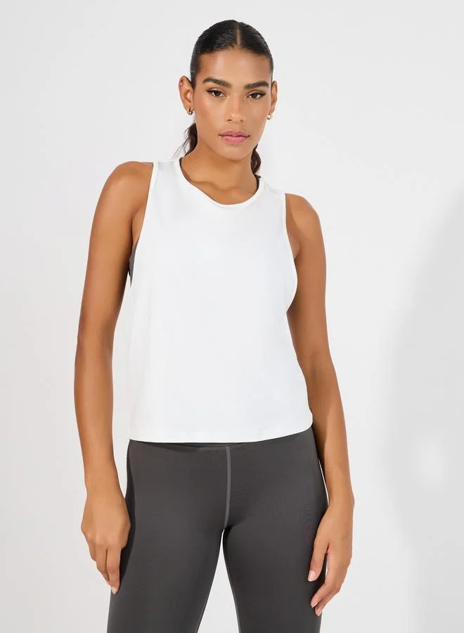 Styli Pack of 3 - Reflective Twist Back Tank, Cross Over Strap Sports Bra & Leggings Set