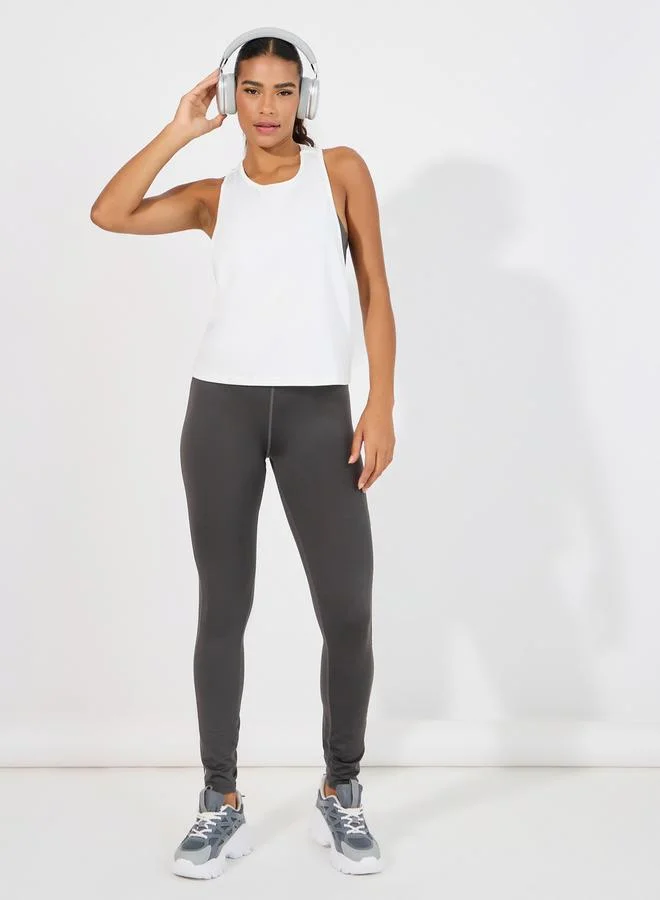 Styli Pack of 3 - Reflective Twist Back Tank, Cross Over Strap Sports Bra & Leggings Set
