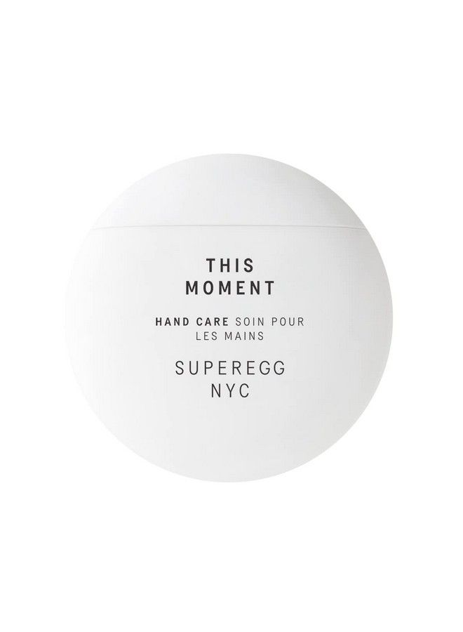 SUPEREGG رعاية اليدين من ذي مومنت: ليدين ناعمتين وحريريتين. رعاية يدوية طبيعية مع النياسيناميد وزبدة المورومورو. 60 مل / 2 أونصة سائلة - Image 1