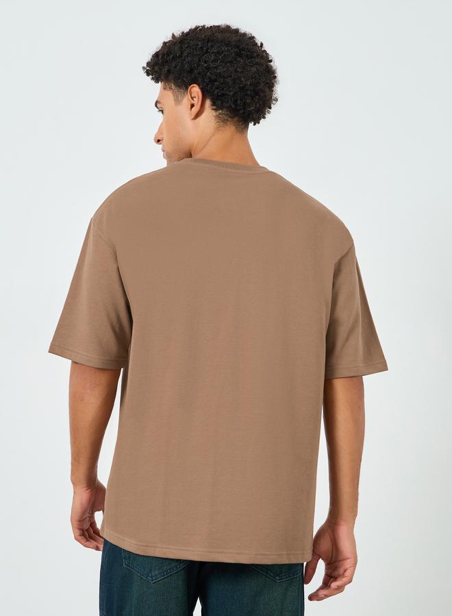 Styli Men Brown Oversized Graphic Print T-Shirt - Image 3
