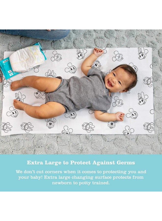 J.L. Childress Disney Baby by J.L. Childress Disposable Changing Pads for Baby - Disney Travel Essential - Diaper Changing Table Liners - Disposable Travel Changing Pads, 26"x18" - Mickey & Minnie Mouse - Pack of 24  - Image 2