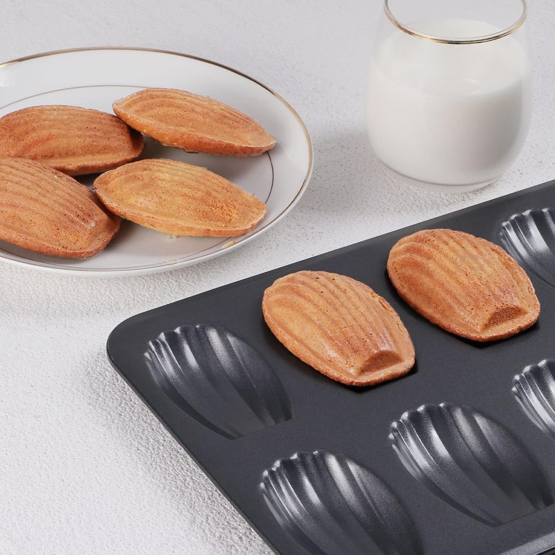 HONGBAKE صينية خبز ماندلين غير لاصقة من هونغبايك ( Nonstick Madeleine Pan)، عبوة تحتوي على 2 صينيات، كل صينية تحتوي على 12 فتحة، مصممة لخبز الكوكيز من نوع ماندلين في الفرن، مقاومة للتشوه، بشكل قوسي، لون ذهبي شامبانيا (Champagne Gold). - Image 4