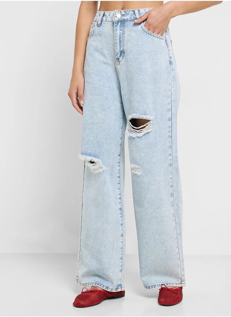 جينجر High Rise Relaxed Fit Ripped Jeans