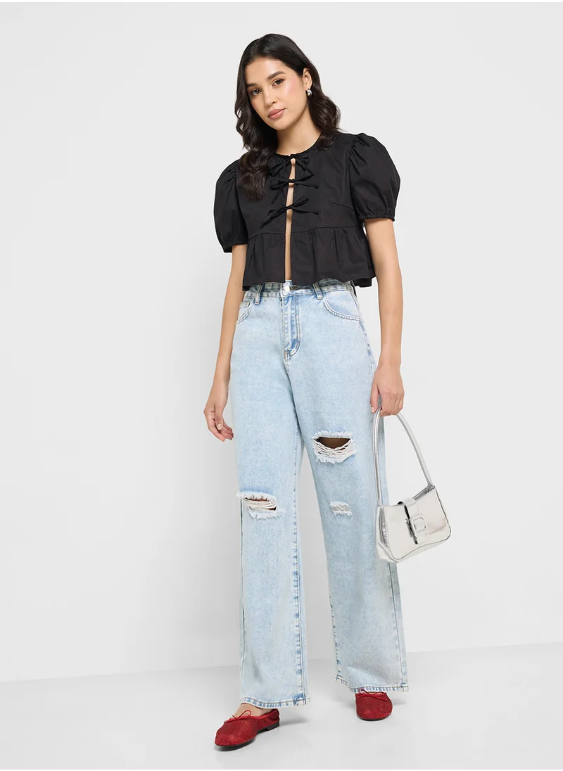 جينجر High Rise Relaxed Fit Ripped Jeans