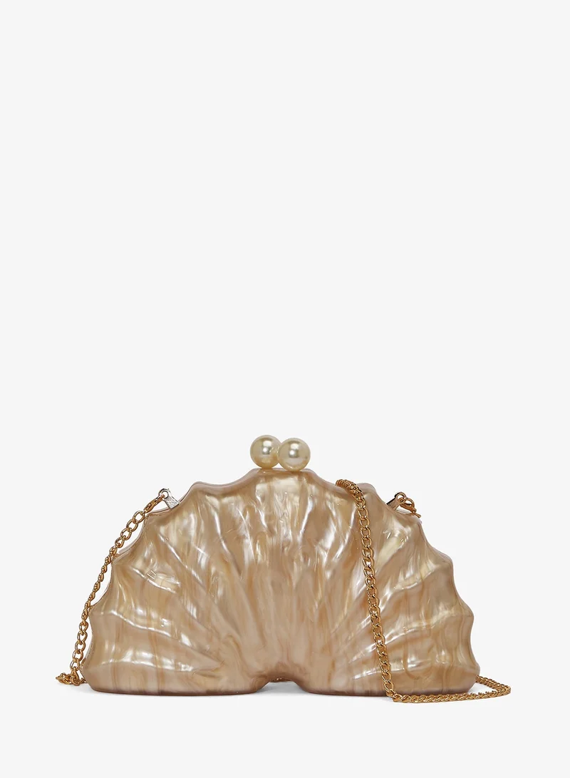 نمشي x حقيبة يد صدفية من الراتنج بتفاصيل مميزة