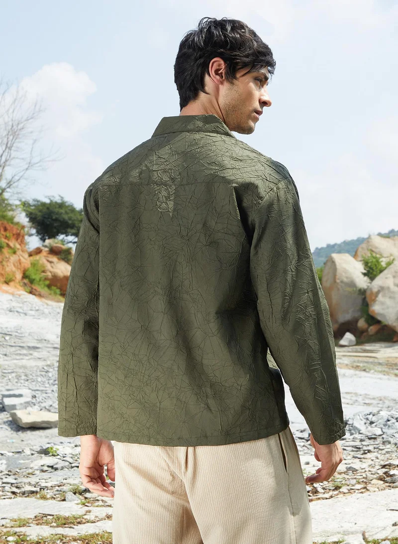 Campus Sutra Campus Sutra Men's Army Green Wrinked Korean Oversized Shirt For Casual Wear | Lapel Collar | Long Sleeve | Button Closure | Oversized Shirt Crafted With Comfort Fit For Everyday Wear