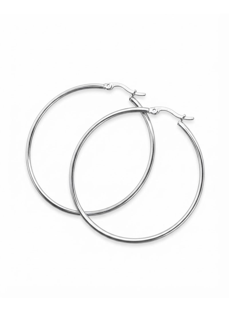 Luxuria Women's silver-tone hoop earrings, 4.5 mm in diameter, made of stainless steel. - Image 1