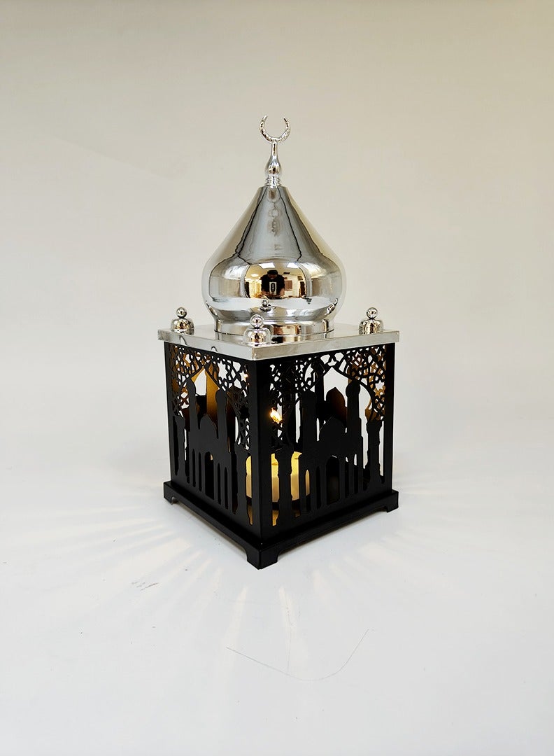 Living A lantern illuminated in an Islamic style, black in color, with a silver dome, measuring 35x14x14 cm. - Image 3