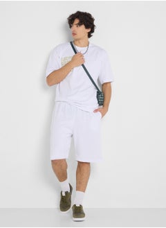Seventy Five Graphic T-Shirts And Shorts Sets  - Image 1