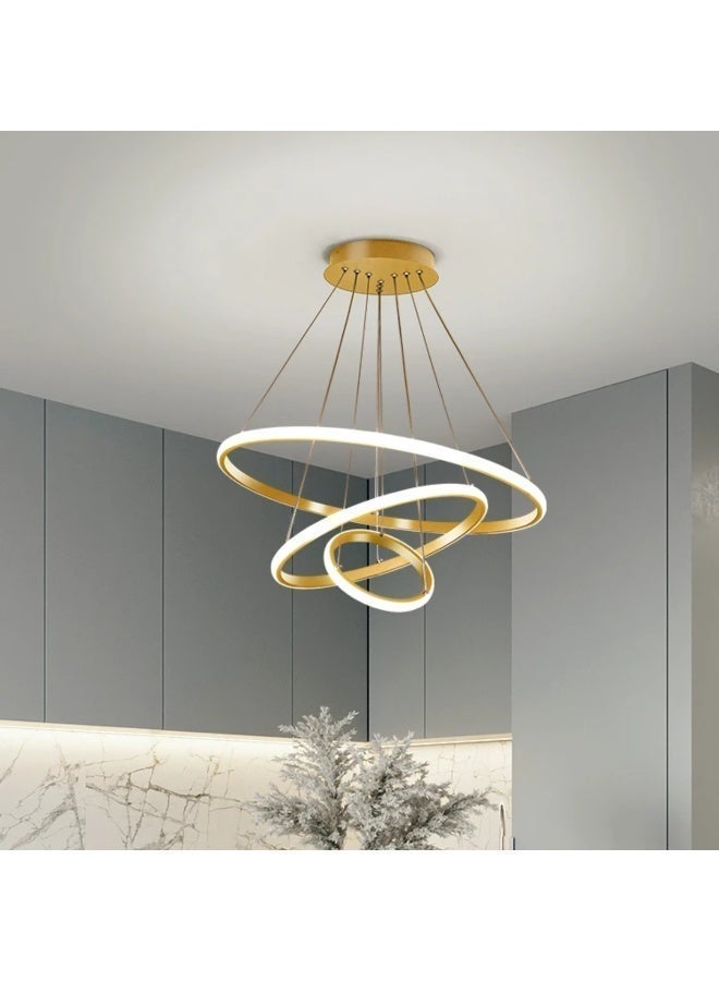 AL THURAYAT Luxurious and modern 60cm LED chandelier with three gold-colored circular LED rings, offering three lighting colors, made from high-quality materials, with remote control.(Gold color) - Image 5