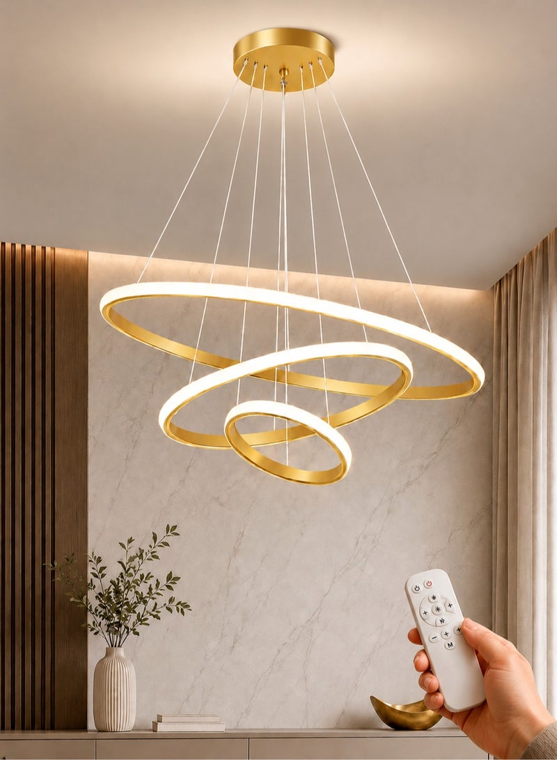 الثريات ثريا LED مودرن 60 سم – 3 ألوان إضاءة مع ريموت كنترول – تصميم حلقات دائرية فاخرة – إنارة سقف ذهبية للصالون وغرفة المعيشة - Image 1