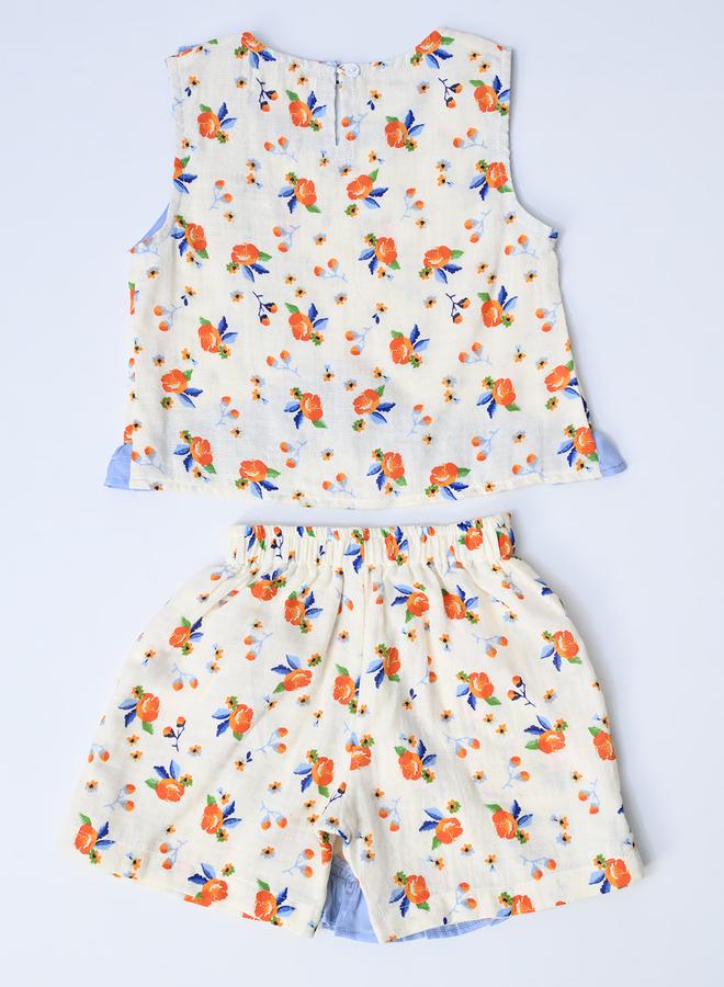 بيلا مودا طقم بلوزة وشورت بطبعات زهور وتفاصيل مكشكشة من بيلا مودا - Image 3