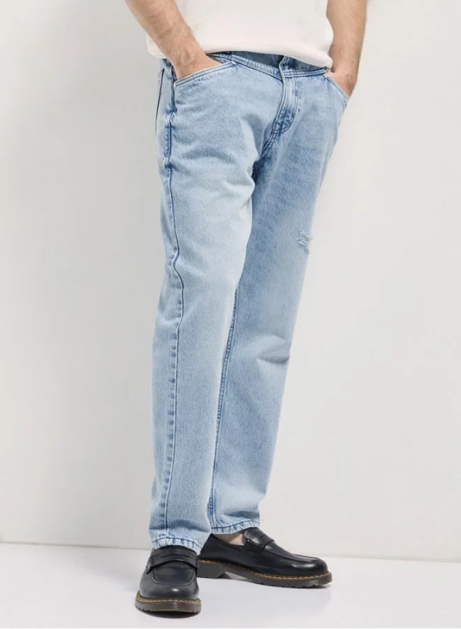 The Bear House  Men's Light Blue with Light Fade Distressed Patch Mid-Rise Relaxed Fit Jeans Classic Comfort With Modern Style, Perfect For Everyday Casual Looks And Effortless Streetwear Vibes for Men | Best Price UAE