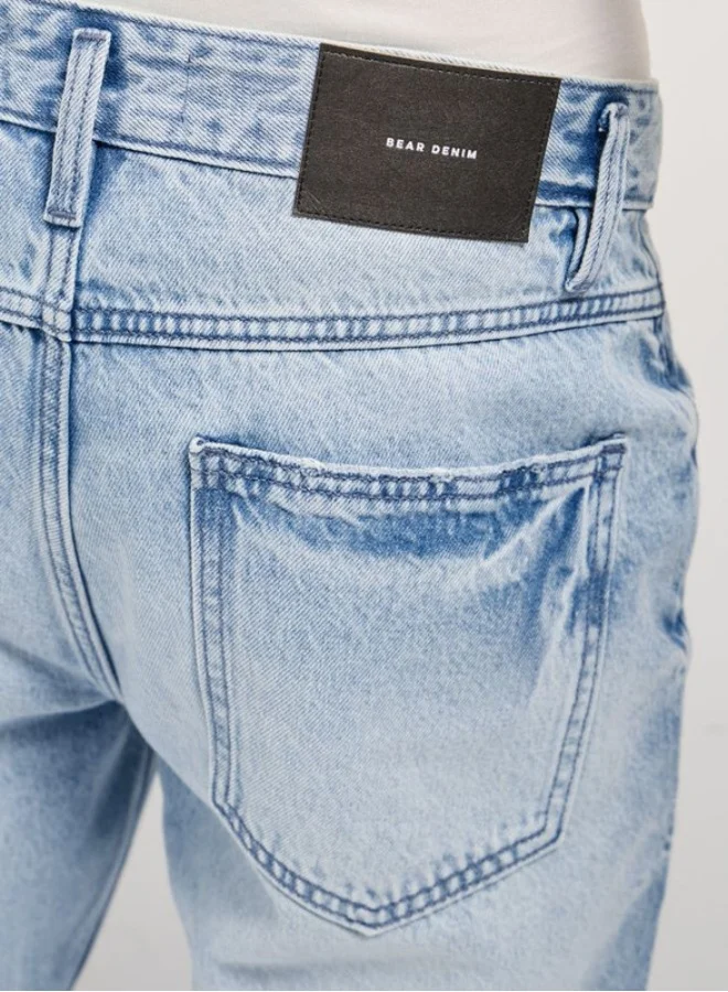 The Bear House  Men's Light Blue with Light Fade Distressed Patch Mid-Rise Relaxed Fit Jeans Classic Comfort With Modern Style, Perfect For Everyday Casual Looks And Effortless Streetwear Vibes for Men | Best Price UAE
