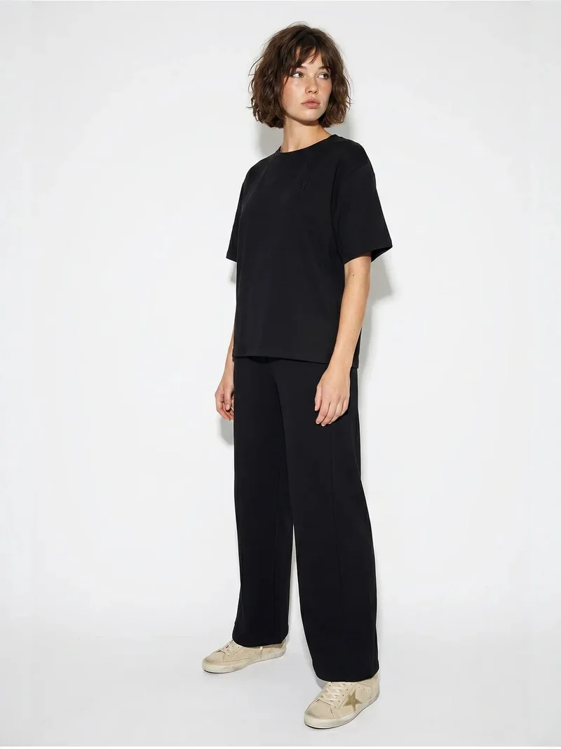 بيانكو لوتشي LUCCI Two-Piece T-Shirt And Wide-Leg Trouser Set