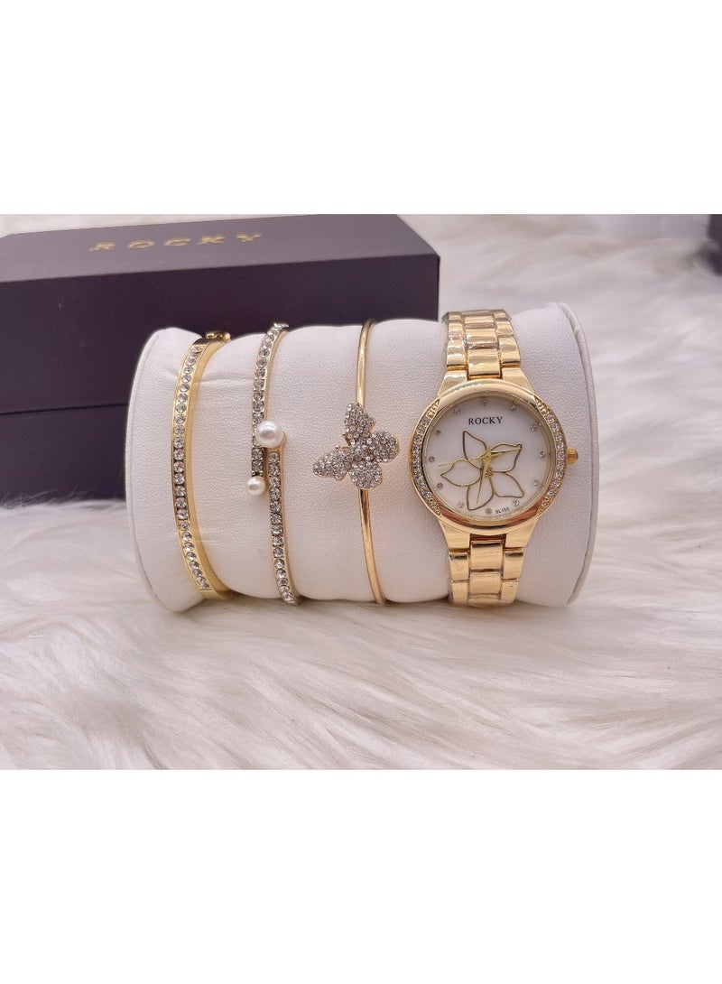روكي طقم نسائي ذهبي ماركة روكي يتكون من ساعة ومجموعة من الاساور من الستانلس ستيل - Image 2