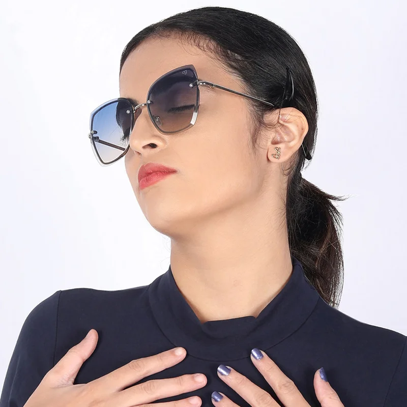 Woggles Latest & Stylish UV Protected Blue Cateye Rimless Sunglasses for Women