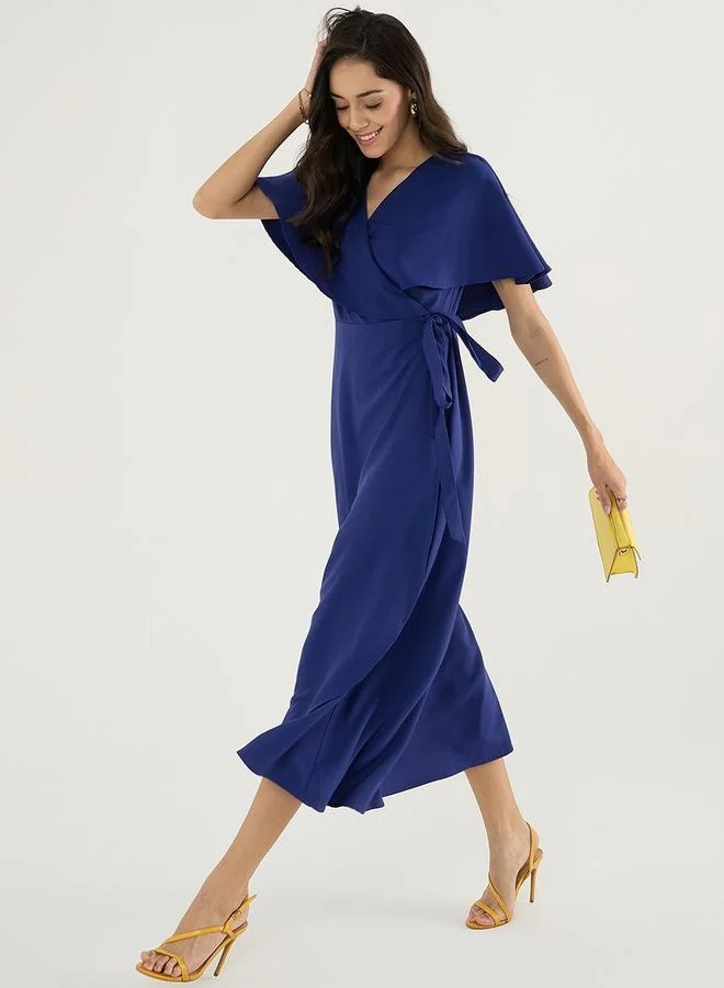 Femmella V Neck wrap Maxi Dress with Tie-Up Belt by Styli