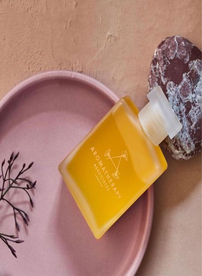 Aromatherapy Associates Inner Strength Bath and Shower Oil, Natural Body Oil to Uplift Mind, Body and Spirit, Made with 3 Essential Oils (1.86 oz) - Image 5