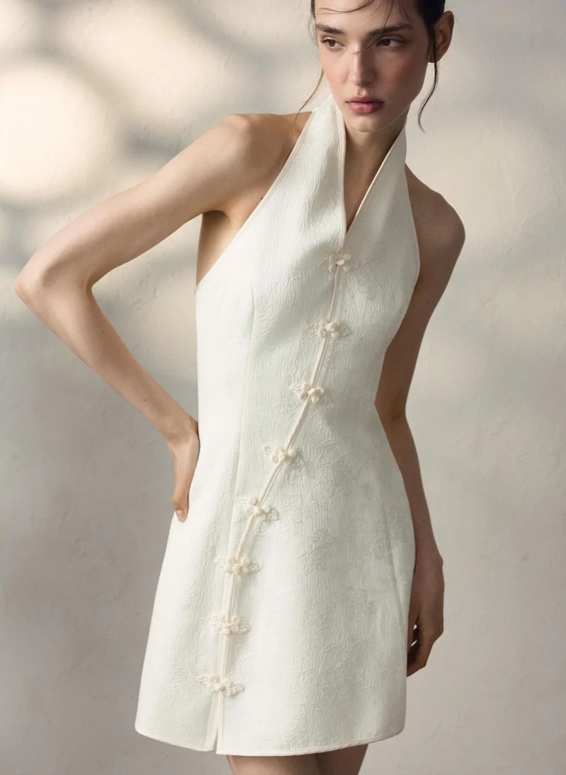 Jacquard mini dress with a diagonal fastening