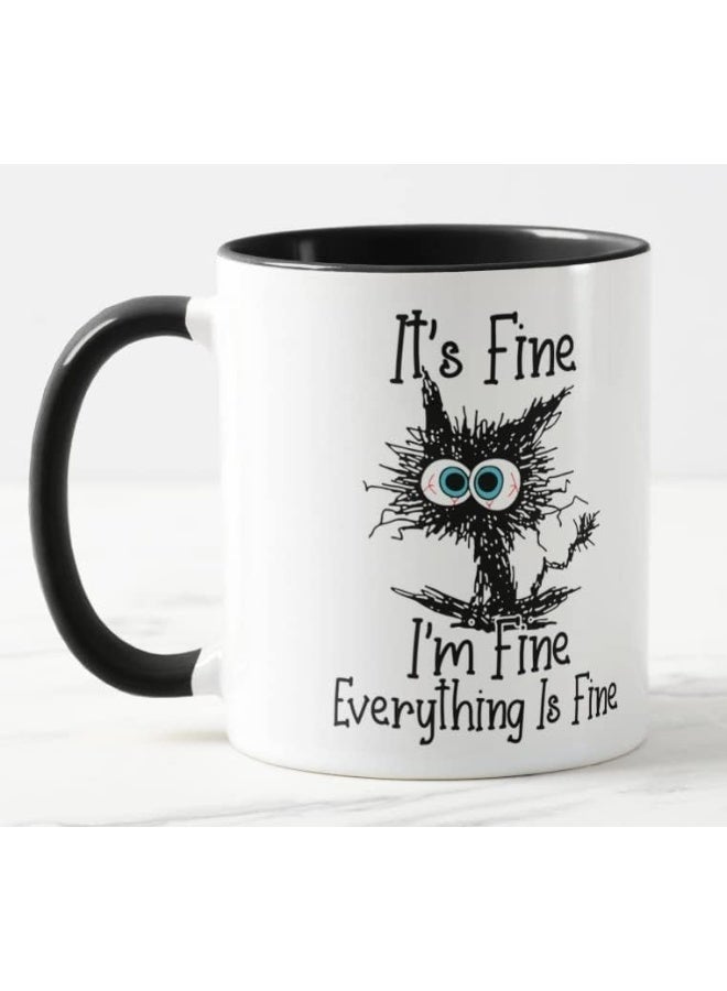 Spoil Your Wall إنه بخير أنا بخير كل شيء بخير نكتة القط كوب ملون هدية عيد ميلاد عمل مكتب عيد الميلاد شاي قهوة (أسود) من سبويل يور وول - Image 2