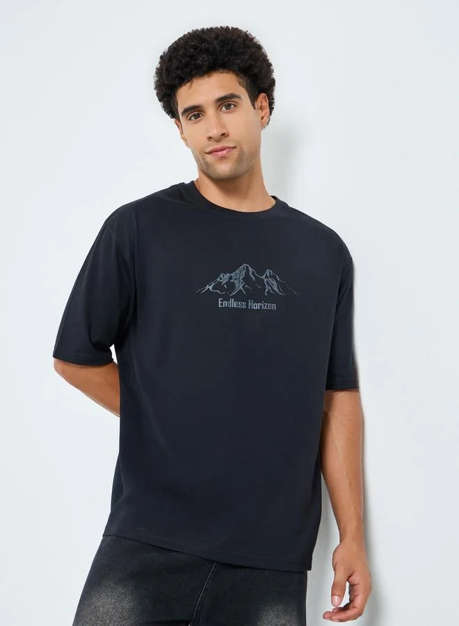 Styli Men Black Graphic Print Oversized T-Shirt