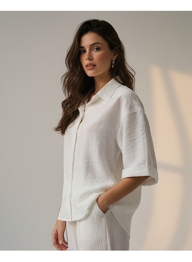 RAVIN Women Luxe Textured Short-Sleeve Button-Down Shirt in Alabaster White - Image 1