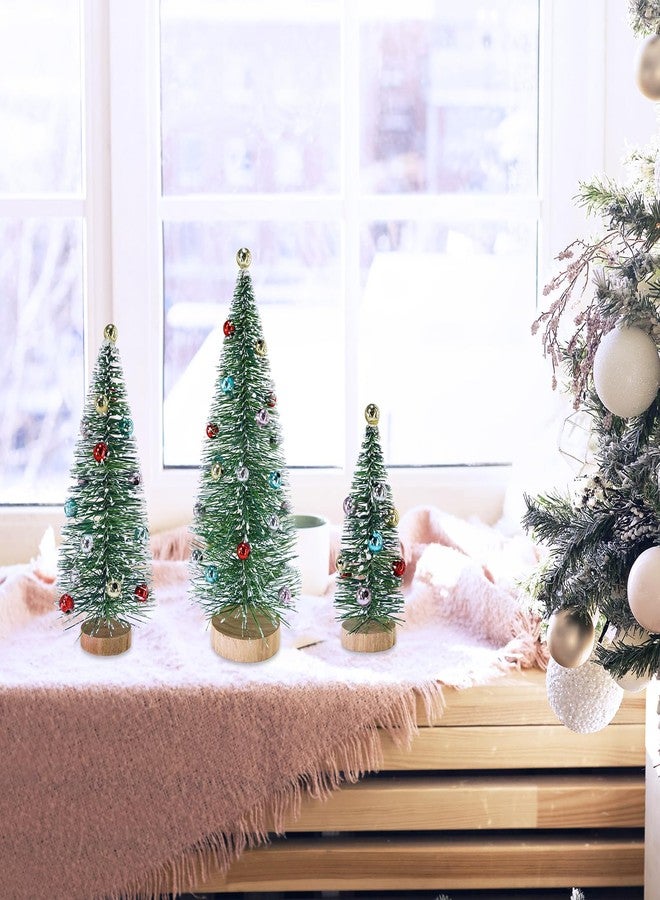 وينلين مجموعة وينلين من 3 أشجار عيد الميلاد الصغيرة الخضراء المصنوعة من السيزال، بقاعدة خشبية وزينة، مناسبة لتزيين طاولة عيد الميلاد، بارتفاع يتراوح بين 4.7 و 9.3 بوصة، مثالية لتزيين قرية عيد الميلاد وحفلات العطلات الشتوية. - Image 4