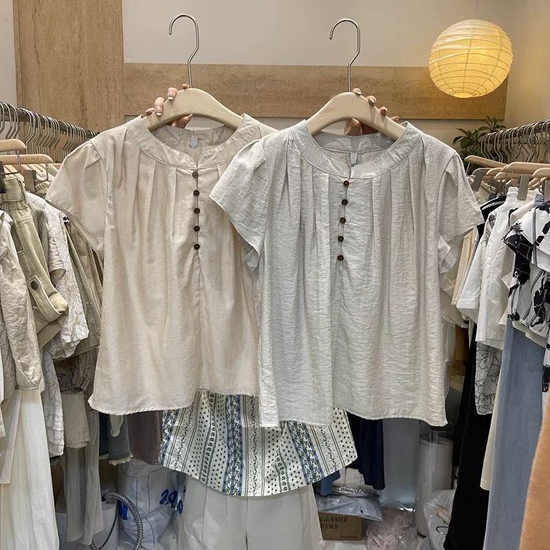 South Korea Dongdaemun commuter summer pure color elegant slimming age-reducing versatile Korean style round neck single-breasted top - Image 1