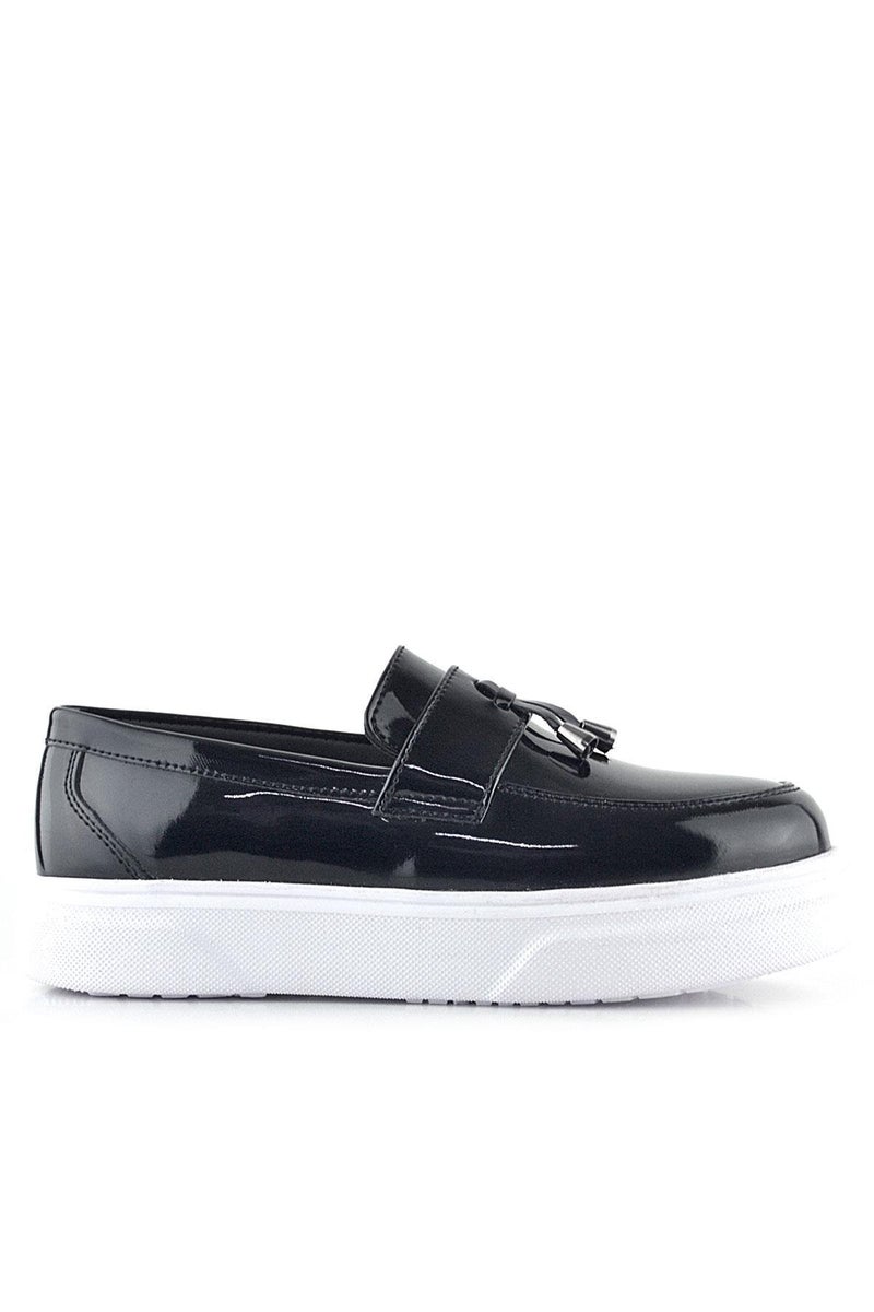 Rakerplus Classic children's shoes from Raker Plus made of glossy black leather and a white sole. - Image 4