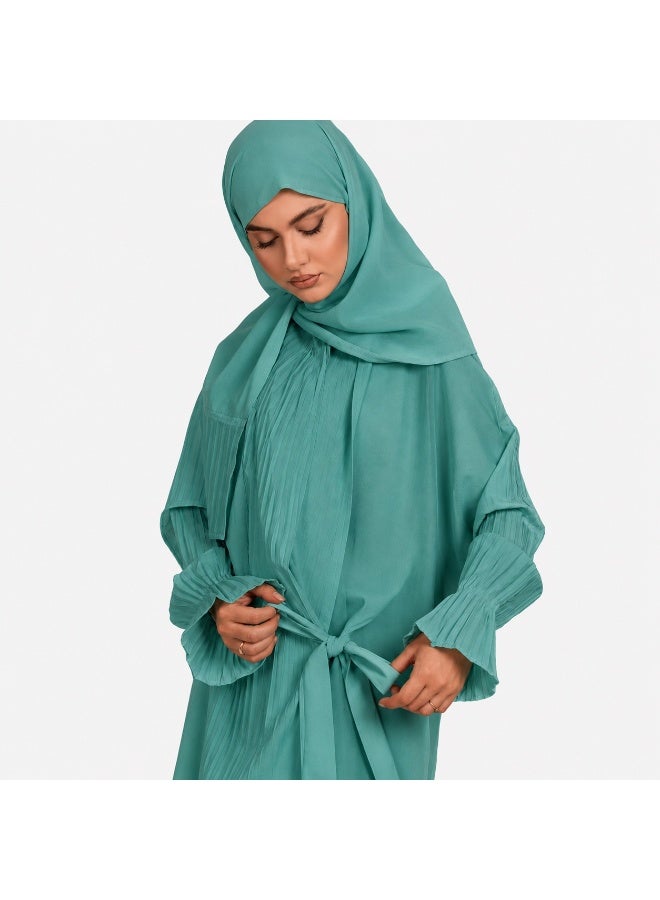 Women's prayer garment featuring an open front with a tie closure and a loose, comfortable fit; designed with soft, pleated sleeves and made from lightweight fabric suitable for prayer, Umrah, Hajj, and daily use.