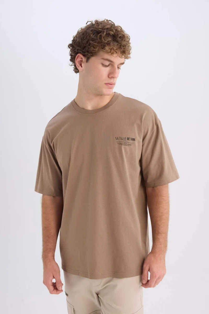 ديفاكتو Oversize Crew Neck Printed Short Sleeve T-Shirt