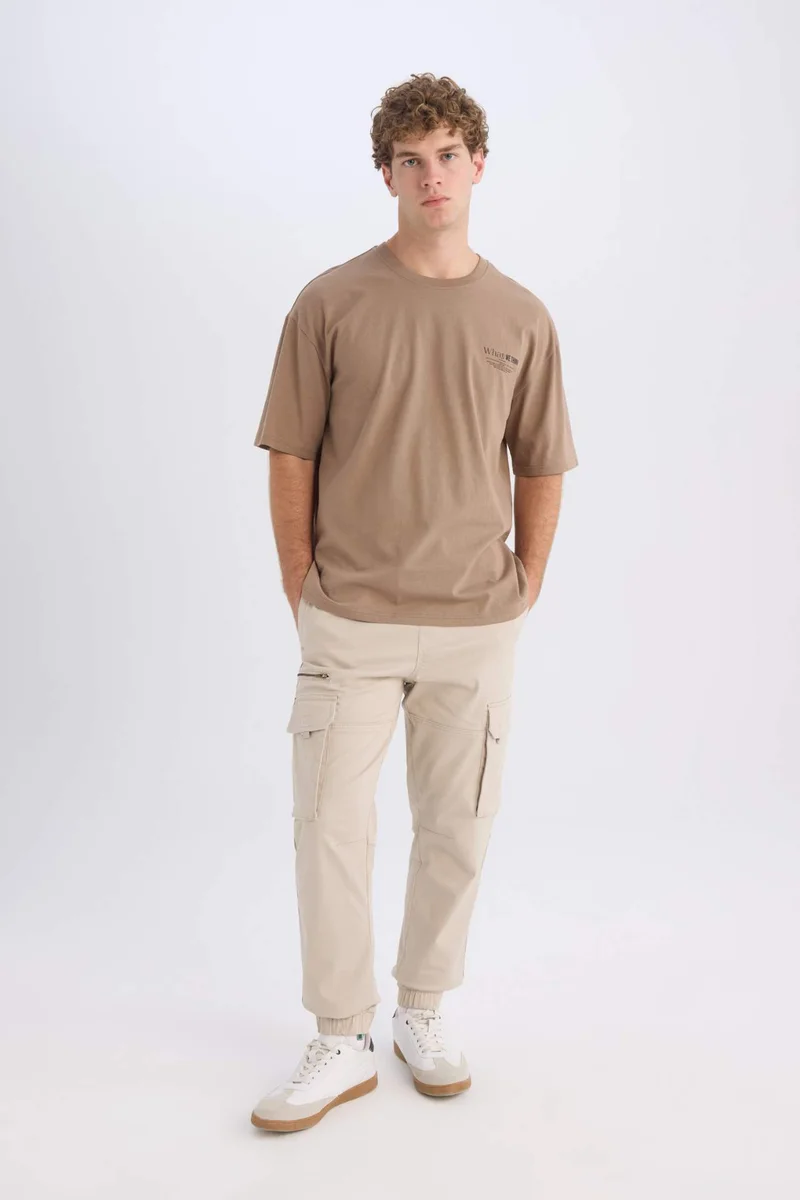 ديفاكتو Oversize Crew Neck Printed Short Sleeve T-Shirt