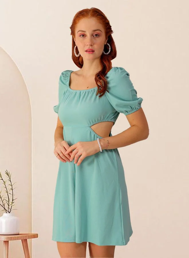 مرفوعة Women Fit and Flared Party Wear Textured Cut Out Dress