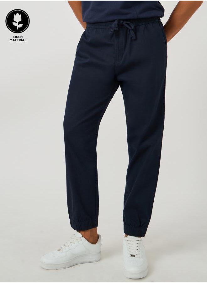 Styli Styli Solid Relaxed Fit Elasticated Cuffed Joggers with Drawstring  - Image 1