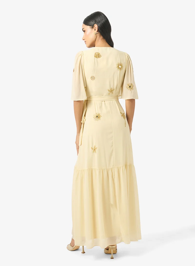 Hope & Ivy Embellished Wrap Flared Sleeve Maxi Dress