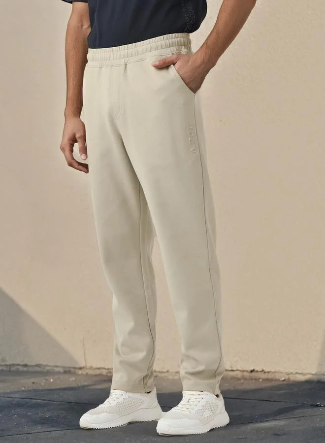 ADOT by Splash Embossed Logo Track Pants with Pockets