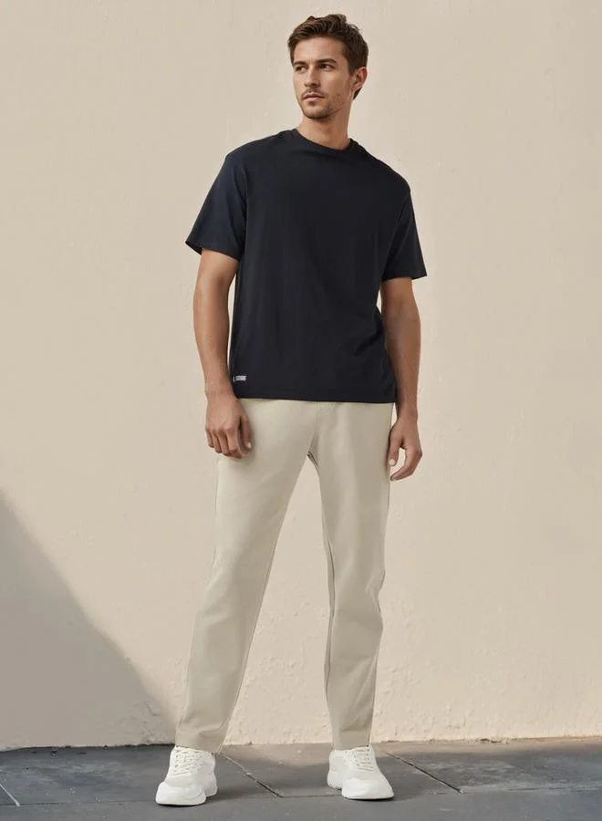 ADOT by Splash Embossed Logo Track Pants with Pockets