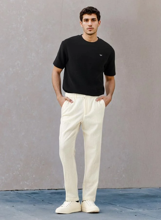 ايكونيك تيشيرت أوفرسيز أيقوني بنقوش بارزة