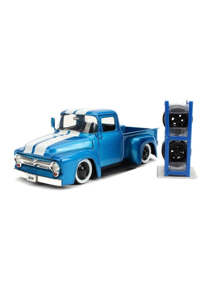 JADA Jada 1956 Ford F-100 Pickup Truck Blue Metallic with White Stripes and Extra Wheels Just Trucks Series 1/24 Diecast Model Car  - Image 1