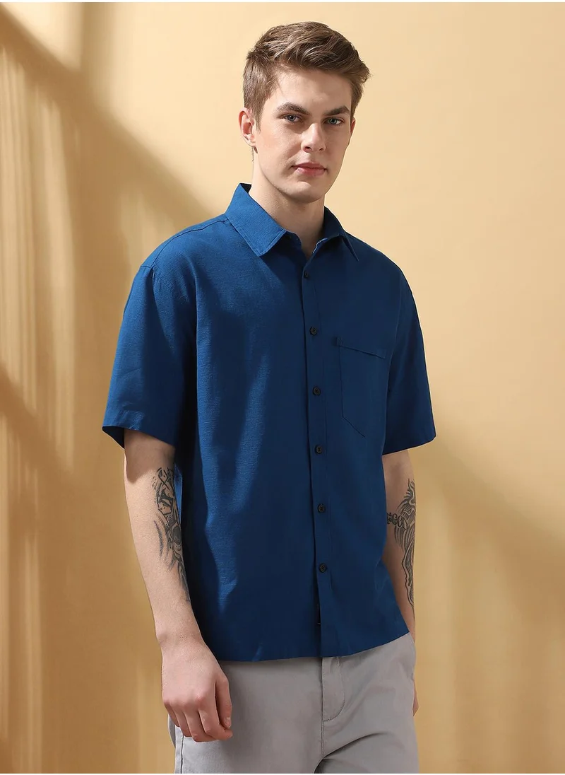 Dennis Lingo Upgrade your wardrobe with this premium Teal blue Relaxed fit Shirts Textured design crafted from 100% Cotton featuring Half Sleeve with Button closure.