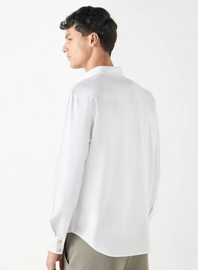 ايكونيك قميص سادة بقصّة عادية وجيوب وأكمام طويلة من أيكونيك