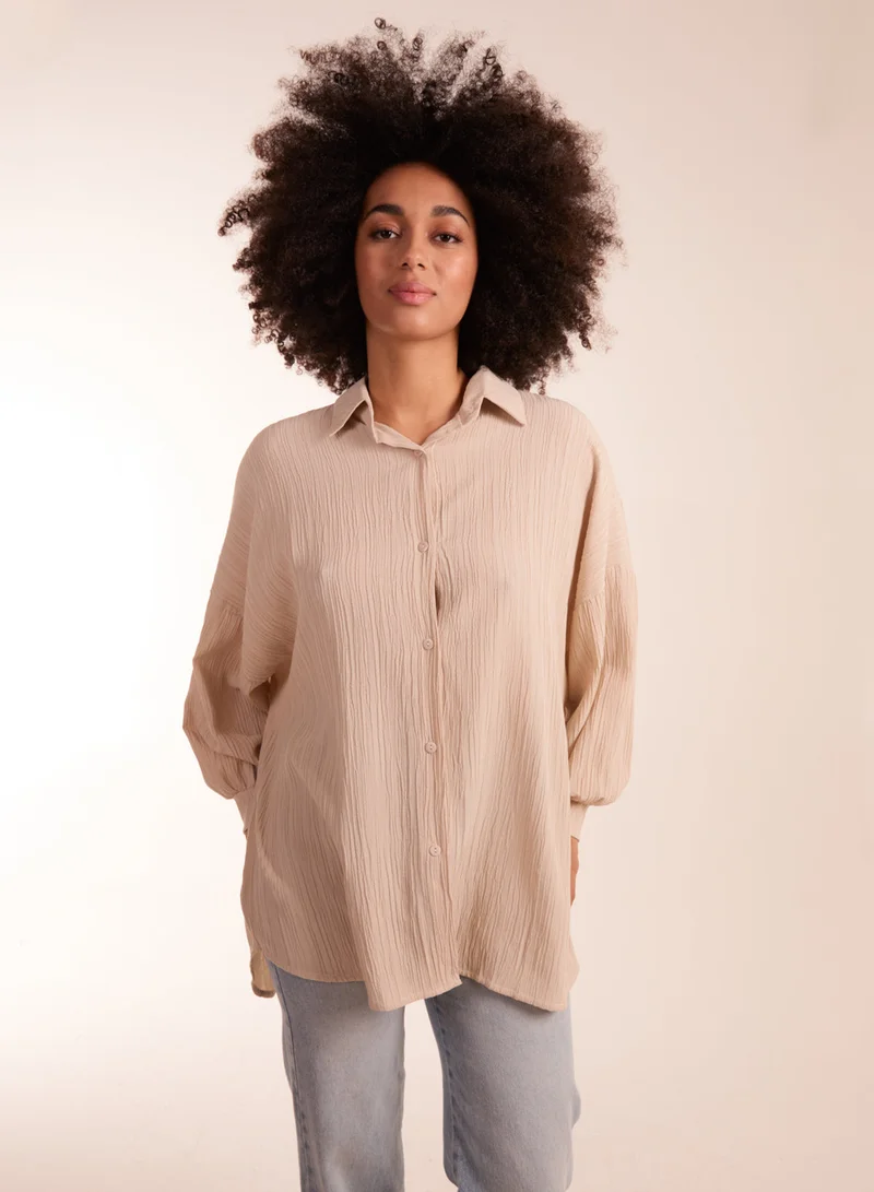 بلو فانيلا قميص فضفاض مجعد