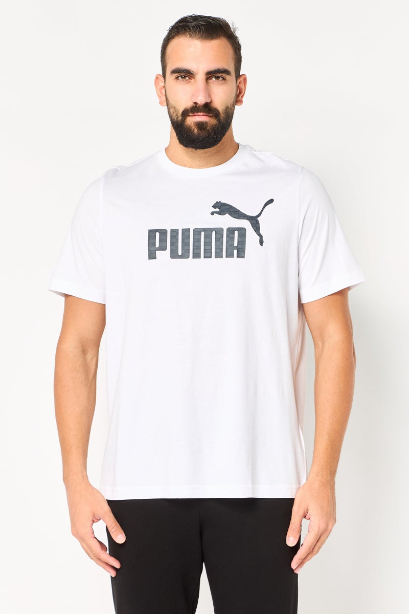 PUMA Men Sportswear Fit Short Sleeve United Outdoor T-Shirt, White - Image 1