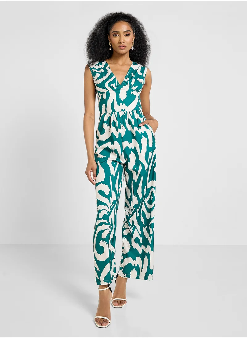 جينجر Plunge Neck Printed Wide Leg Jumpsuit