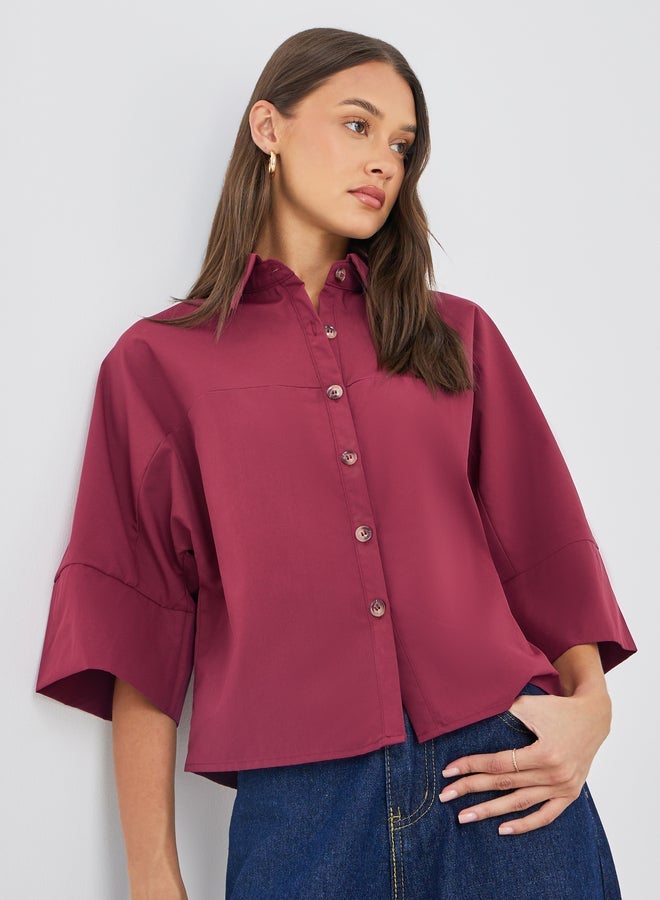 قميص قصير بياقة عريضة وأزرار بقصة بوكسي فيت من ستايلي