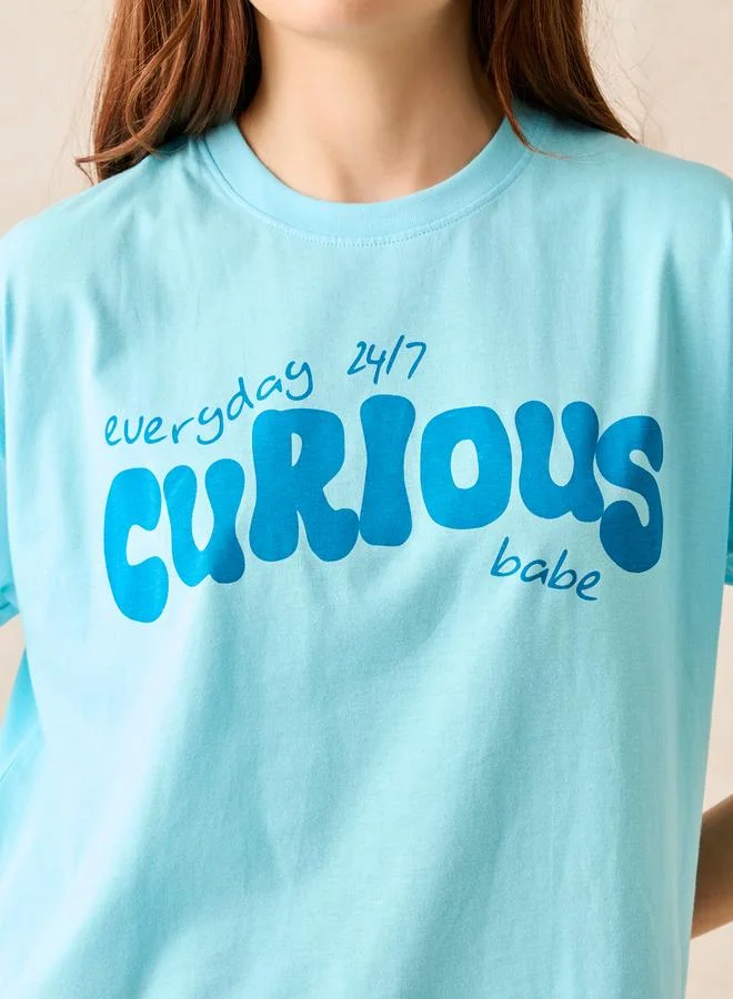 أوجيدر تيشيرت أزرق بطبعة جرافيك وياقة دائرية